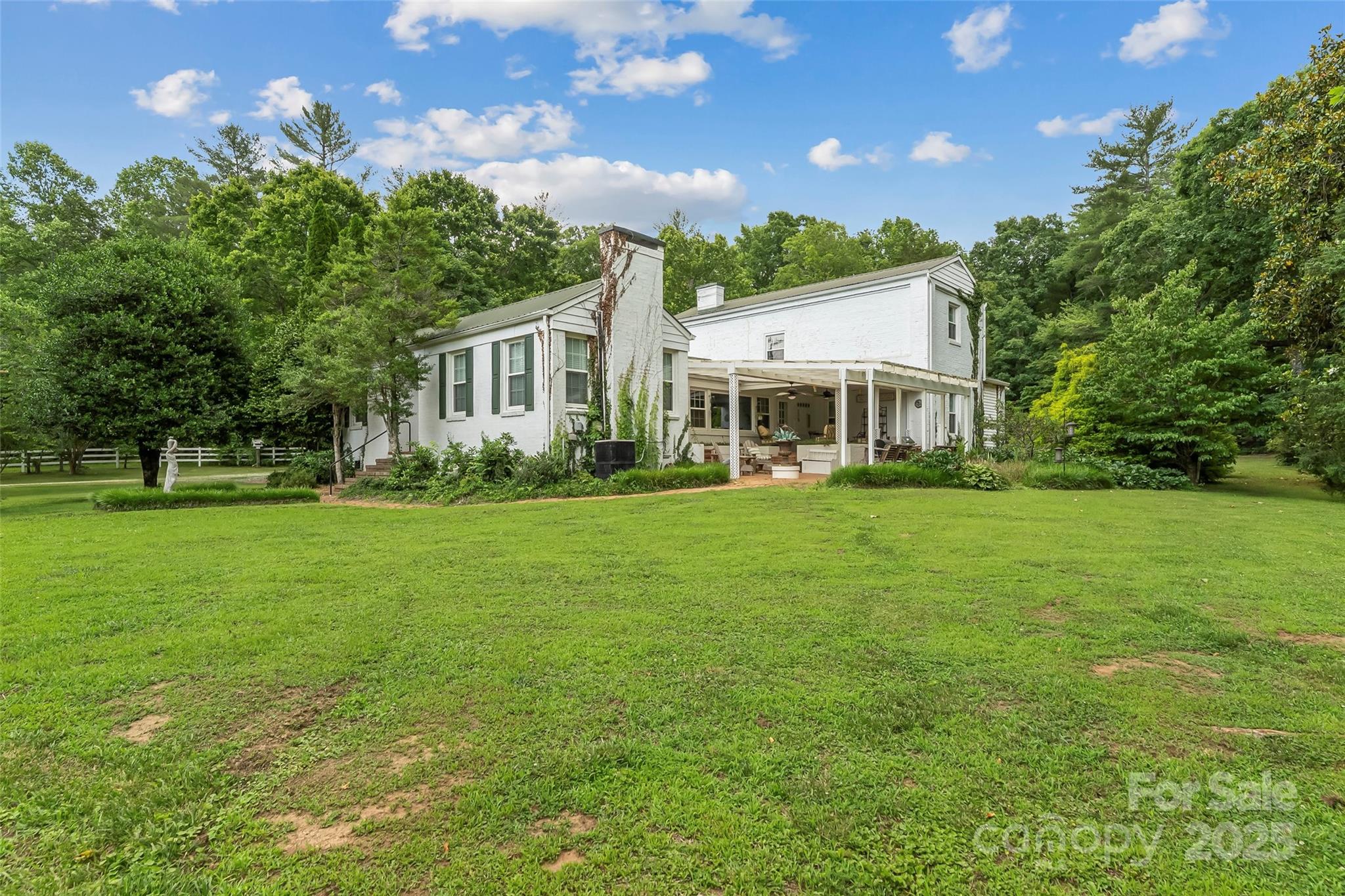 958 Highway 18 Morganton, NC 28655 - Photo 4 of 44 a front view of a house with garden