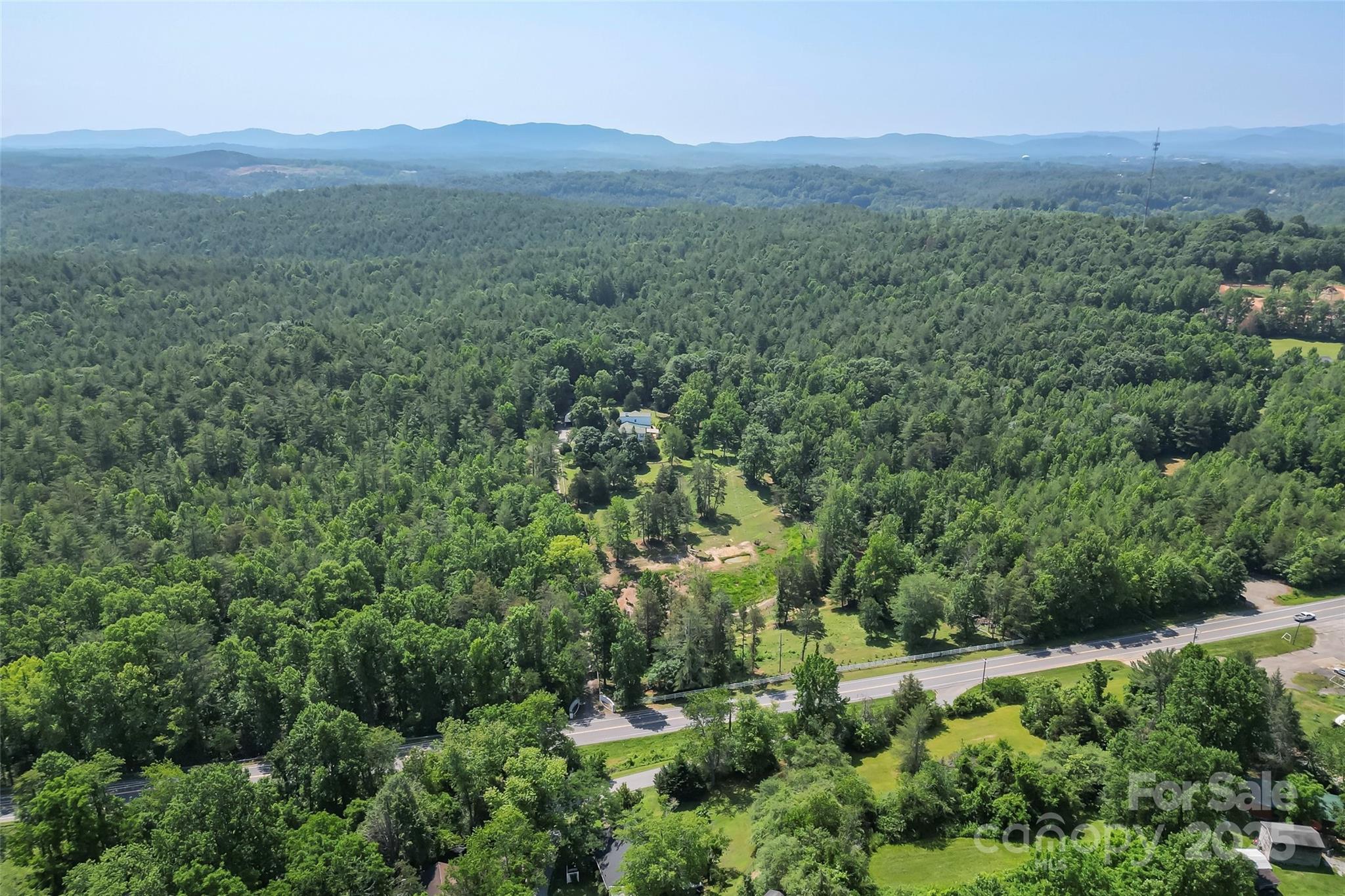 958 Highway 18 Morganton, NC 28655 - Photo 43 of 44 an aerial view of residential house with outdoor space and trees all around