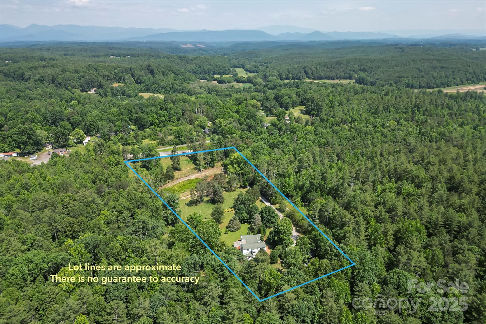 958 Highway 18 Morganton, NC 28655 - Photo 44 of 44 an aerial view of residential houses with outdoor space and trees