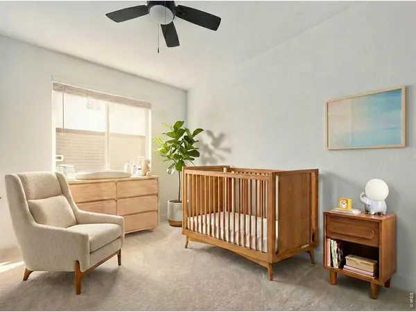 a bedroom with furniture and a window