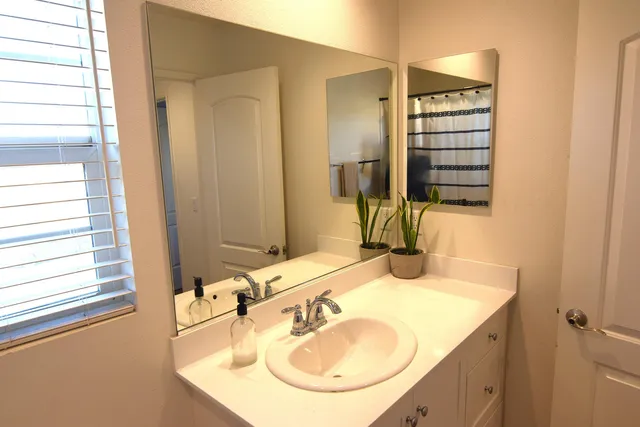 a living room with a bed