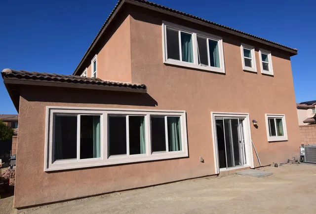 a front view of a house with a balcony