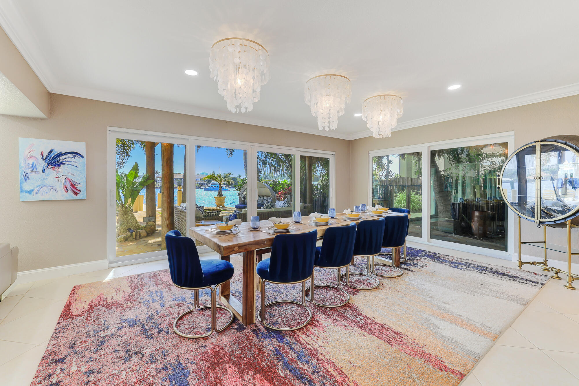 2560 Southeast 7th Drive Pompano Beach, FL 33062 - Photo 13 of 74 a view of a dining room with furniture wooden floor and chandelier