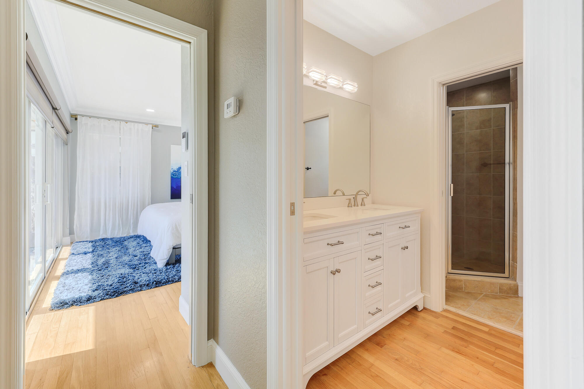 2560 Southeast 7th Drive Pompano Beach, FL 33062 - Photo 28 of 74 a bathroom with a granite countertop sink and a mirror