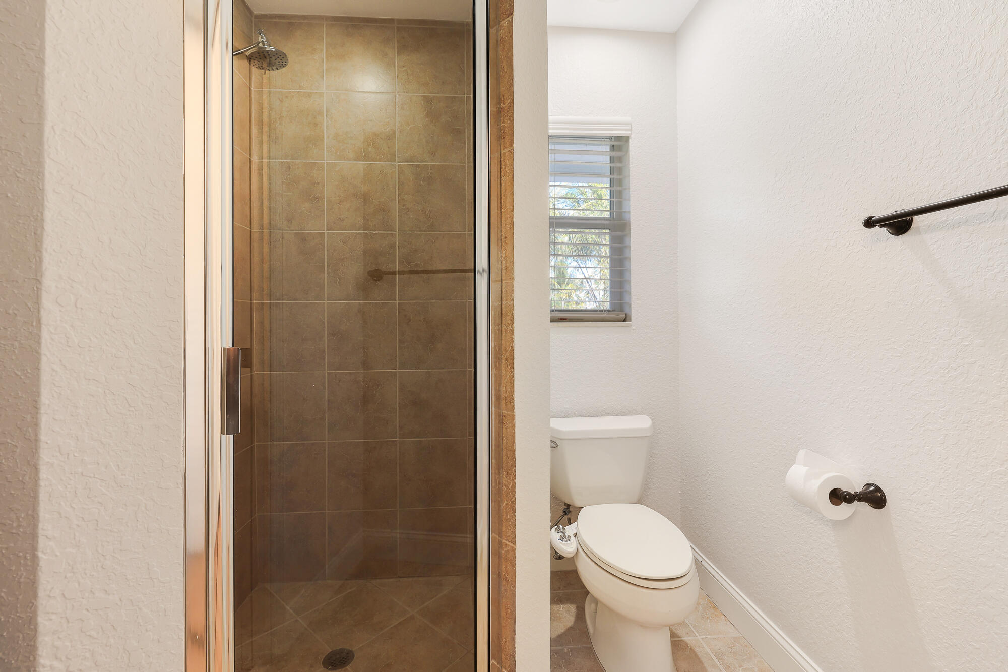 2560 Southeast 7th Drive Pompano Beach, FL 33062 - Photo 30 of 74 a bathroom with a toilet and a shower