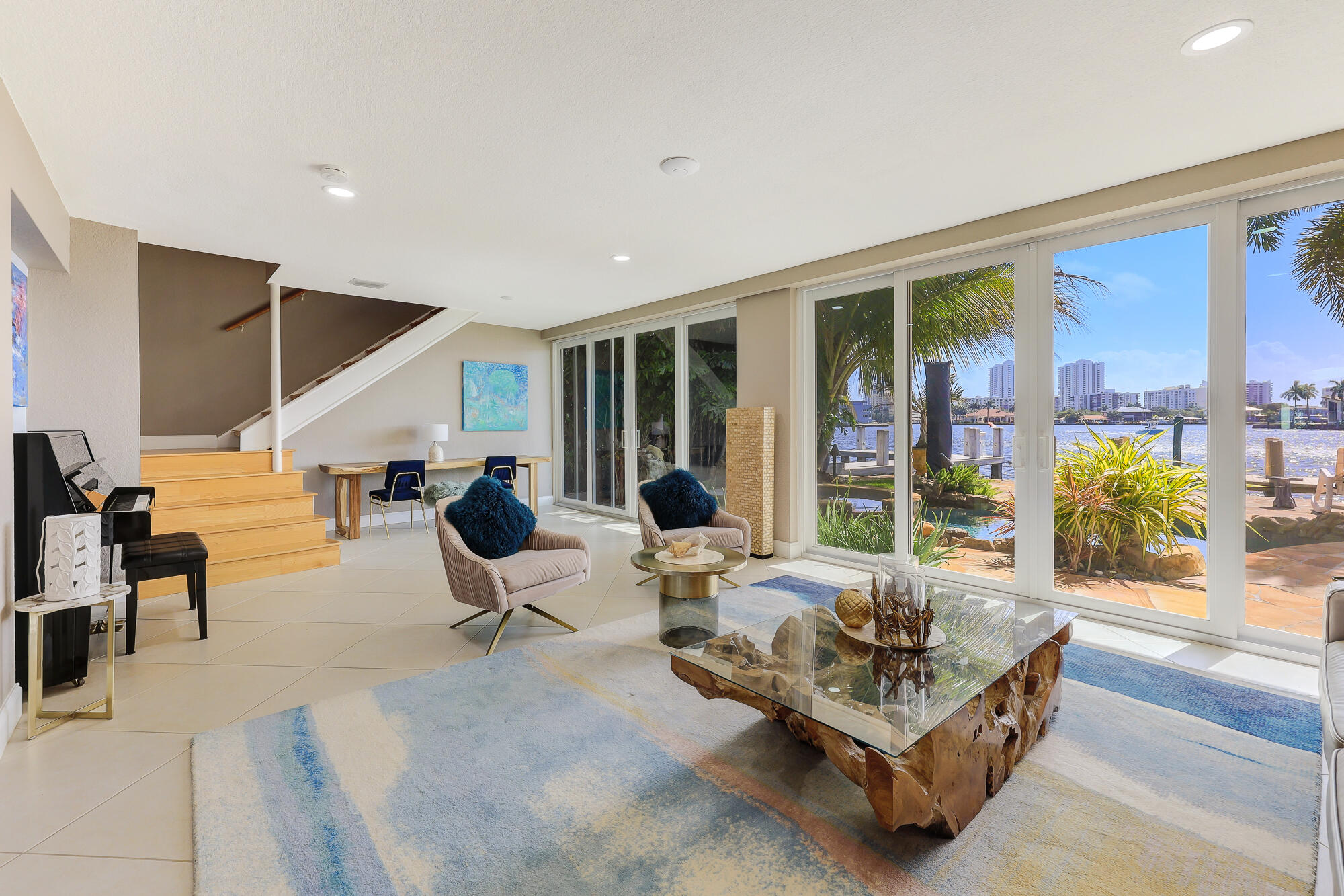 2560 Southeast 7th Drive Pompano Beach, FL 33062 - Photo 9 of 74 a living room with furniture large window and flat screen tv