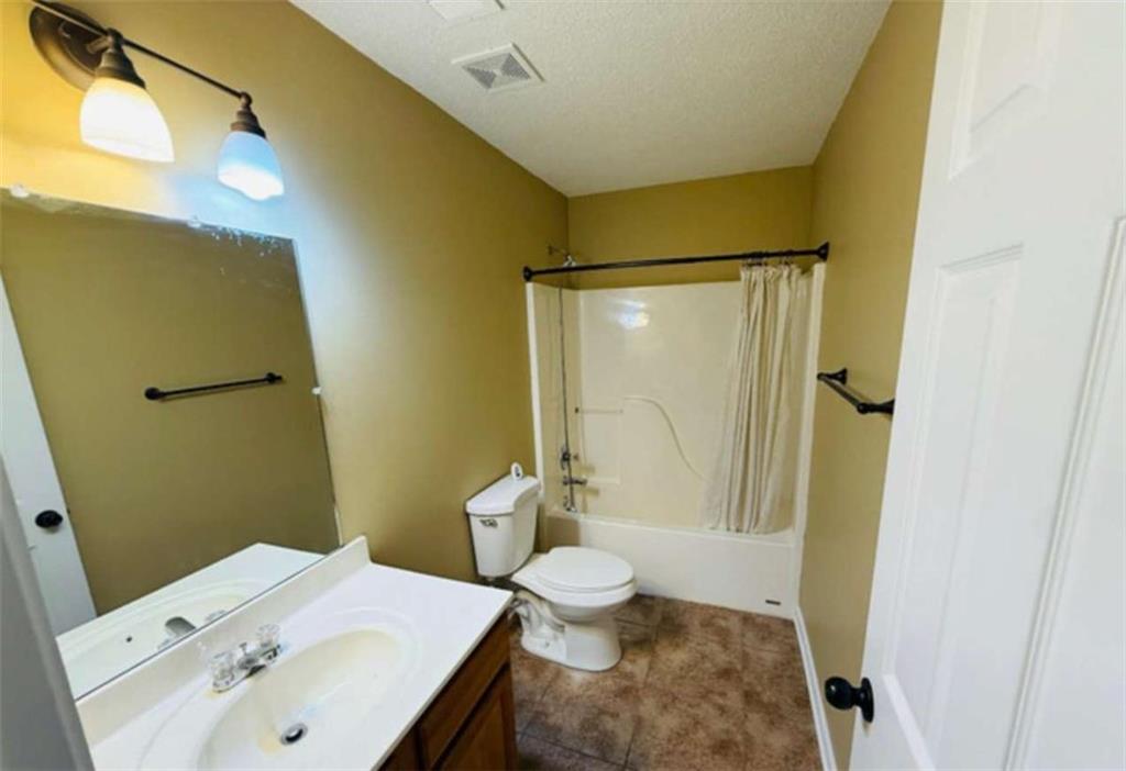 153 Crest Pointe Bremen, GA 30110 - Photo 14 of 24 a bathroom with a sink and a mirror