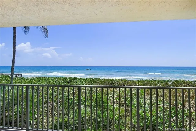 a view of an ocean from a balcony