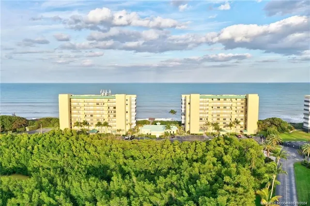 a bathroom with yellow walls