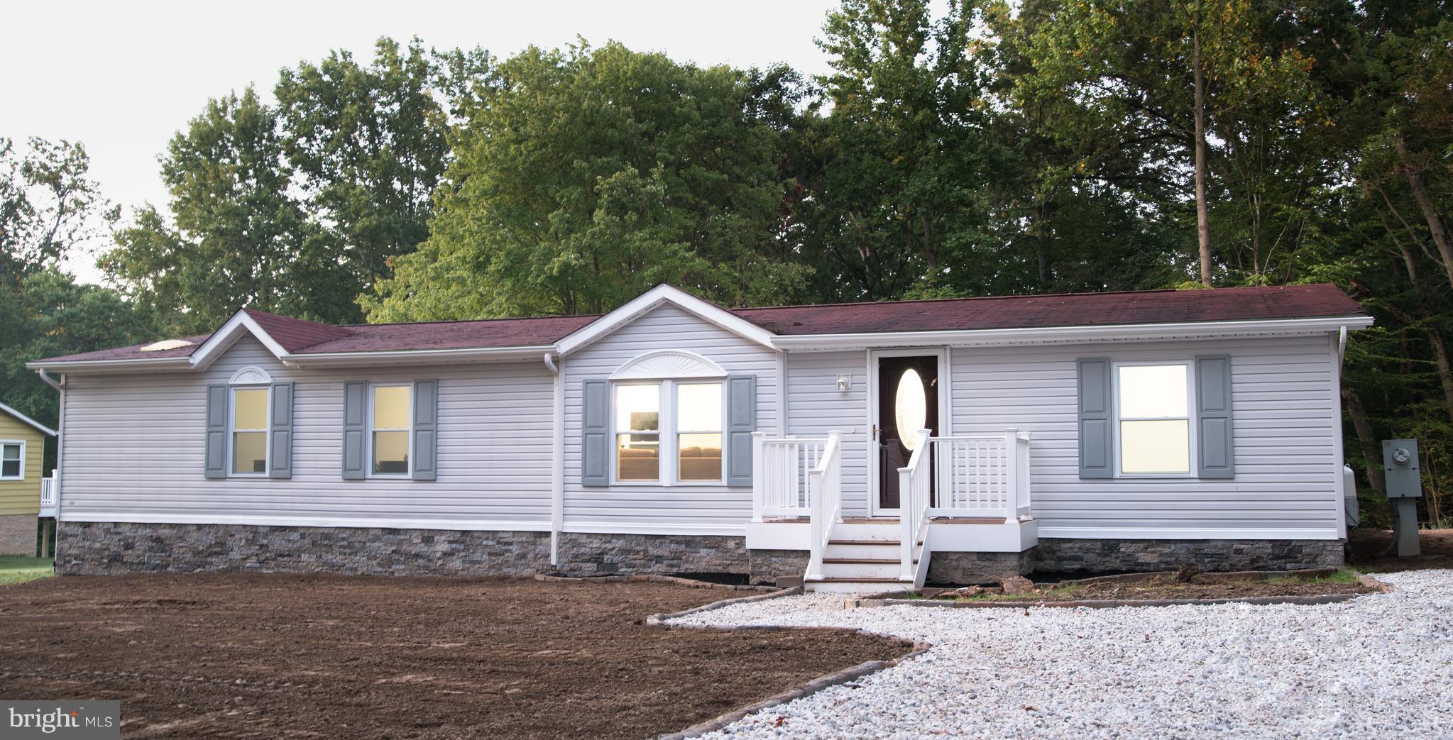 2101 Singer Road Joppa, MD 21085 - Photo 1 of 30 Freshly graded yard w/ LARGE stone driveway.