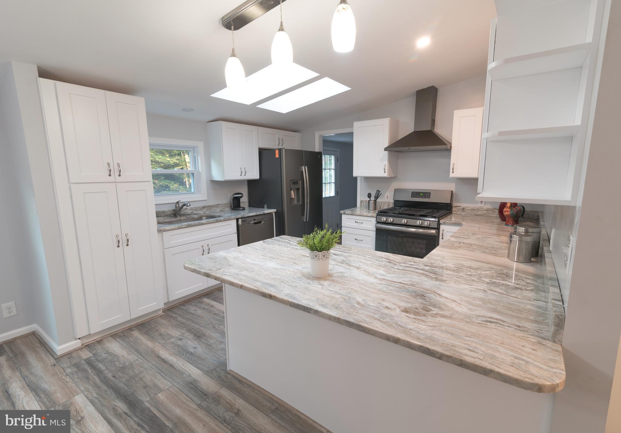 2101 Singer Road Joppa, MD 21085 - Photo 9 of 30 Extra Spacious Kitchen w/ View of the Back Yard