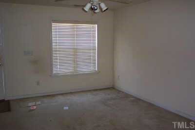 2339 Turtle Point Drive Raleigh, NC 27604 - Photo 4 of 7 an empty room with a window