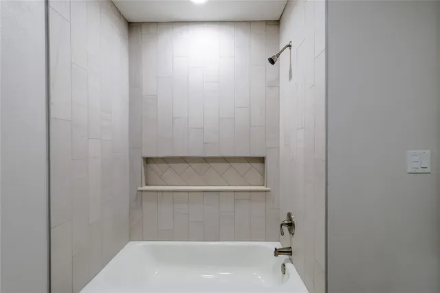 a bathroom with a bathtub