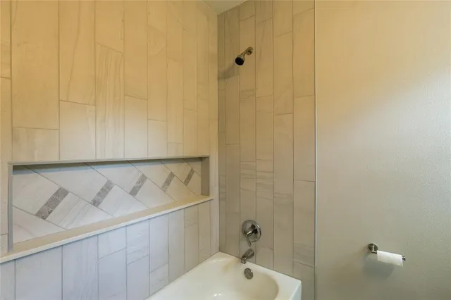 a bathroom with a sink and a shower