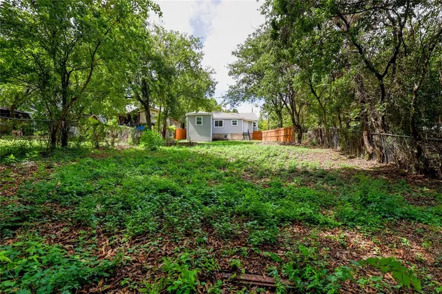 a house view with a garden space