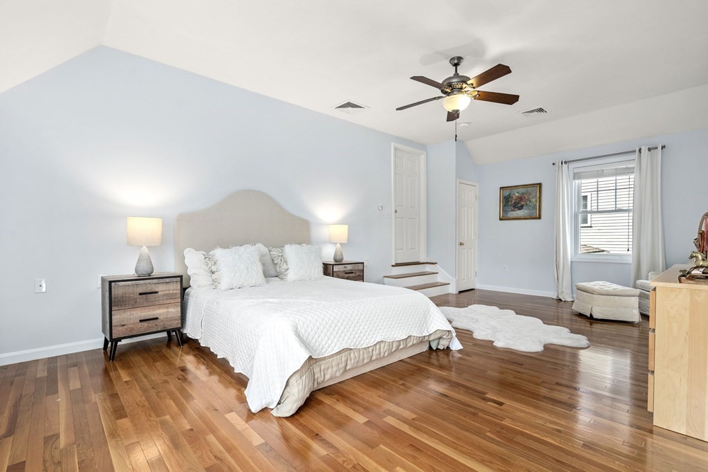 8 Maple Leaf Drive Boston, MA 02136 - Photo 22 of 29 a bedroom with a bed and wooden floor