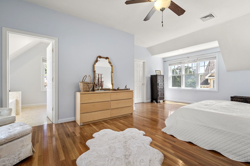 8 Maple Leaf Drive Boston, MA 02136 - Photo 23 of 29 a room with a bed and a dresser