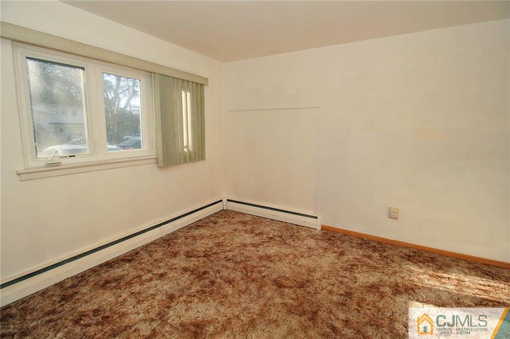54 Starlight Drive Colonia, NJ 07067 - Photo 17 of 25 a view of empty room with window