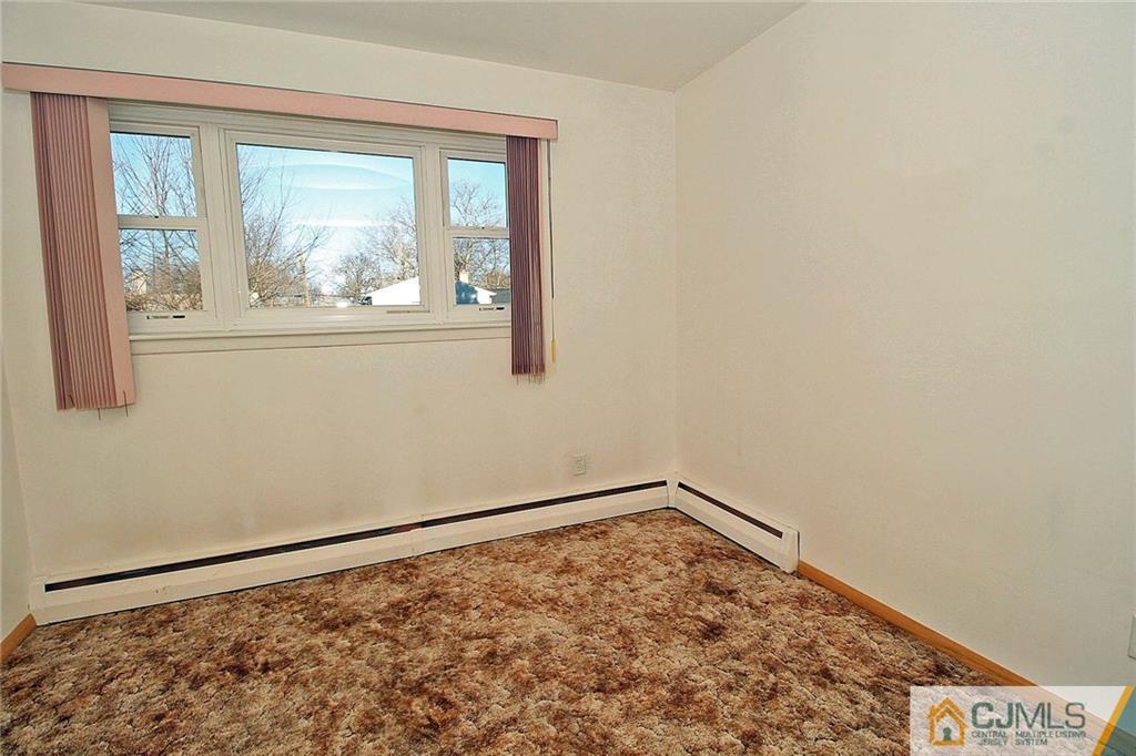 54 Starlight Drive Colonia, NJ 07067 - Photo 19 of 25 a view of empty room with window