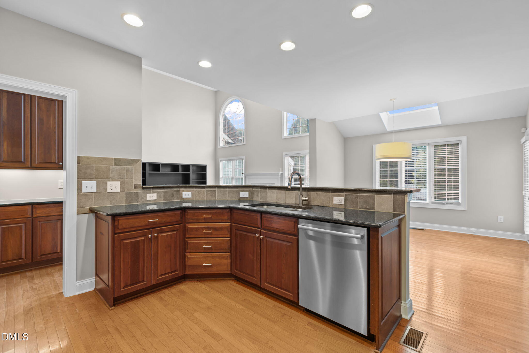 11552 Auldbury Way Raleigh, NC 27617 - Photo 18 of 62 a kitchen with lots of counter space and windows