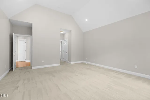 a large bathroom with a tub a sink and a mirror