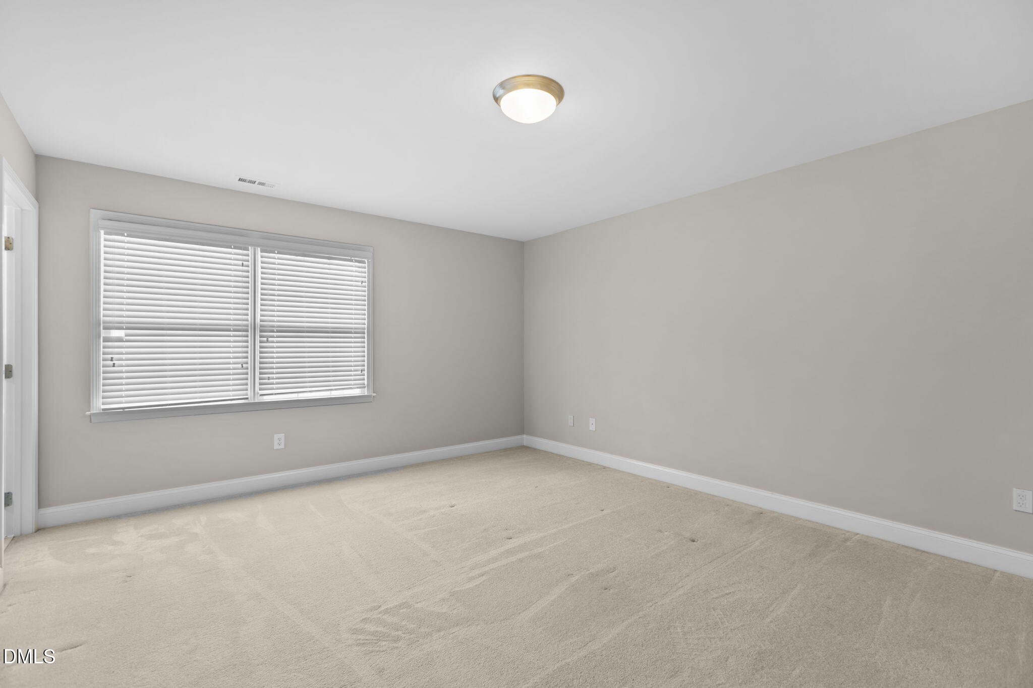 11552 Auldbury Way Raleigh, NC 27617 - Photo 30 of 62 an empty room with windows