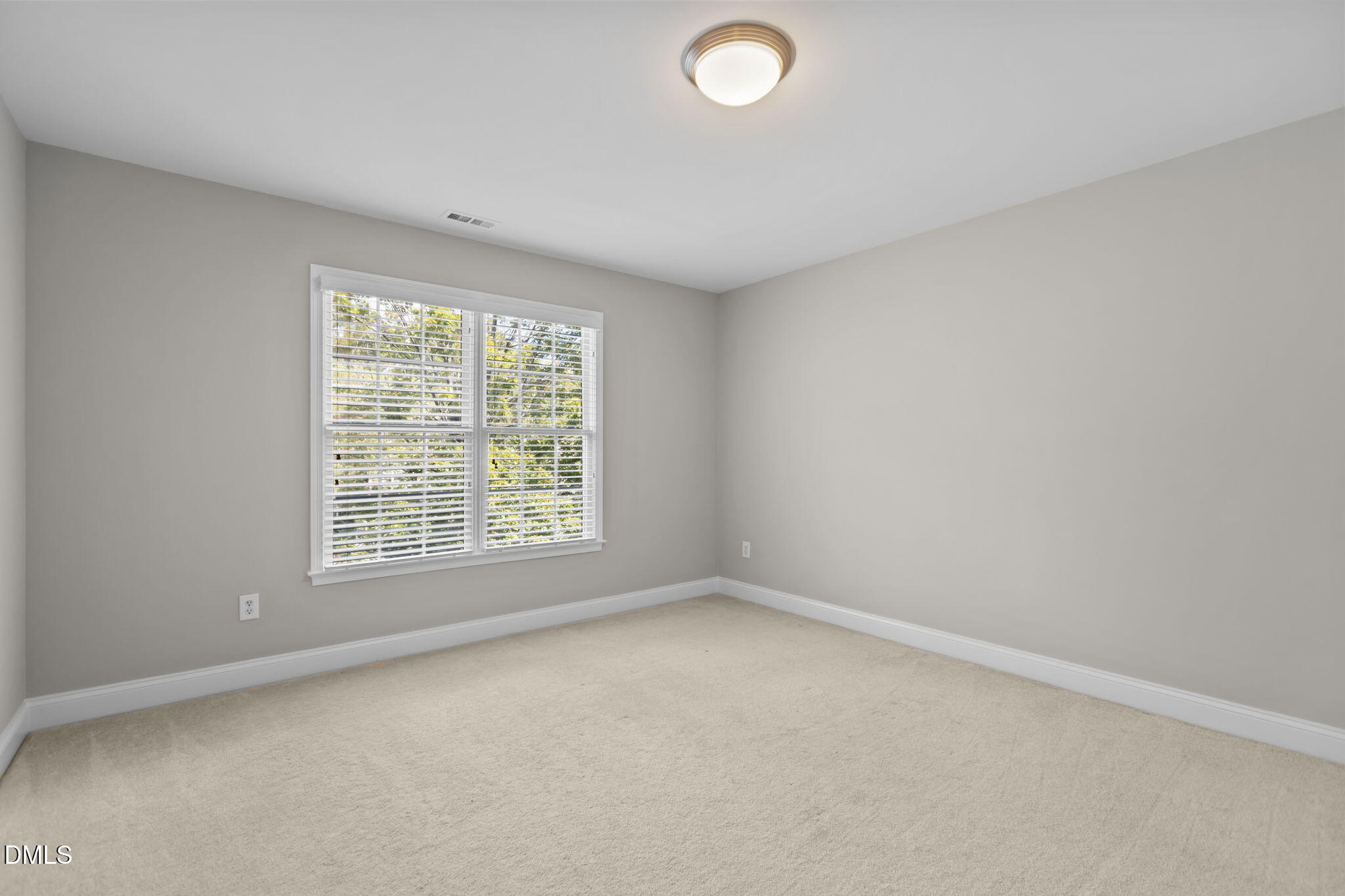 11552 Auldbury Way Raleigh, NC 27617 - Photo 34 of 62 an empty room with a window