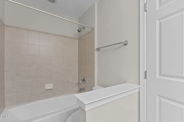 a living room with furniture and window