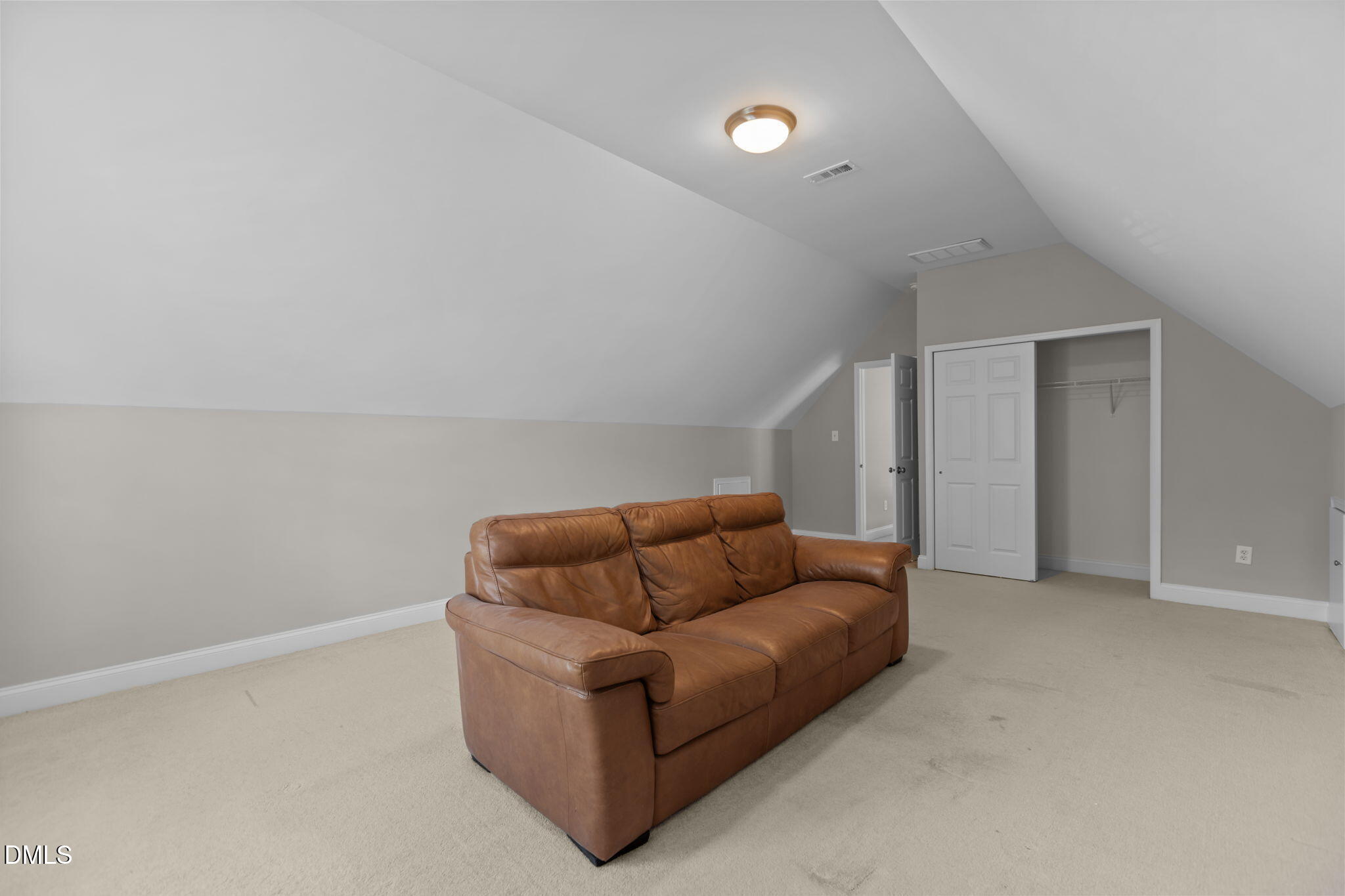 11552 Auldbury Way Raleigh, NC 27617 - Photo 44 of 62 a living room with furniture and a couch