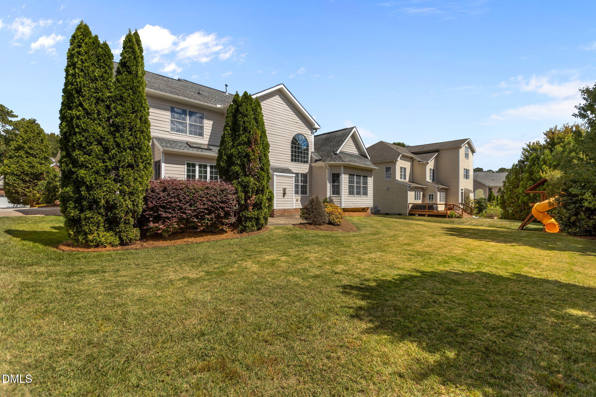 11552 Auldbury Way Raleigh, NC 27617 - Photo 47 of 62 a front view of a house with a yard and trees