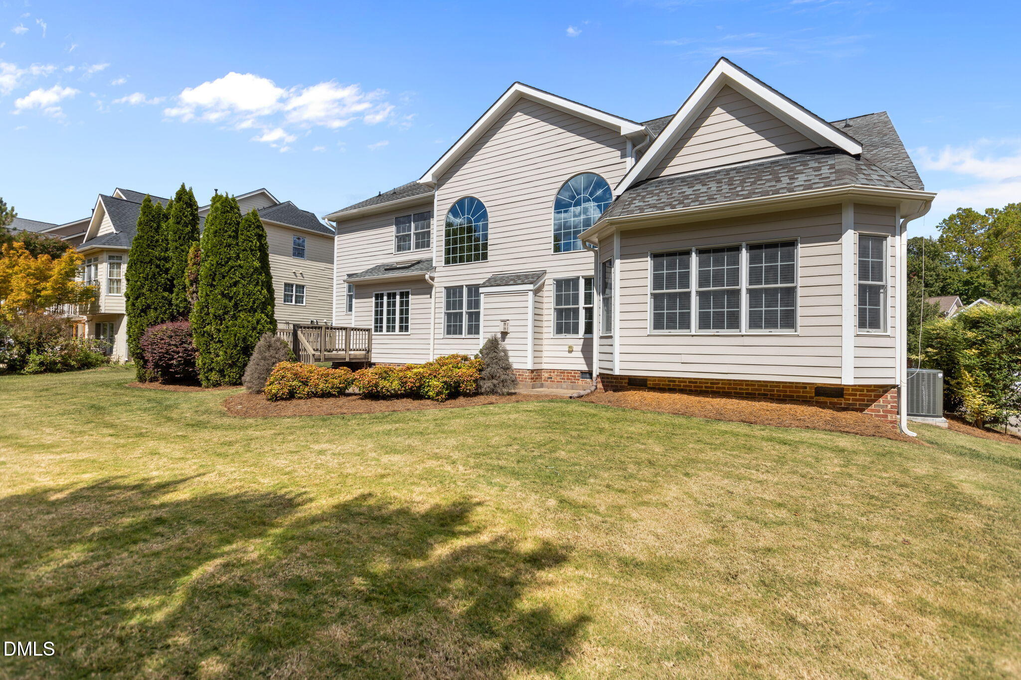 11552 Auldbury Way Raleigh, NC 27617 - Photo 50 of 62 a front view of a house with a garden