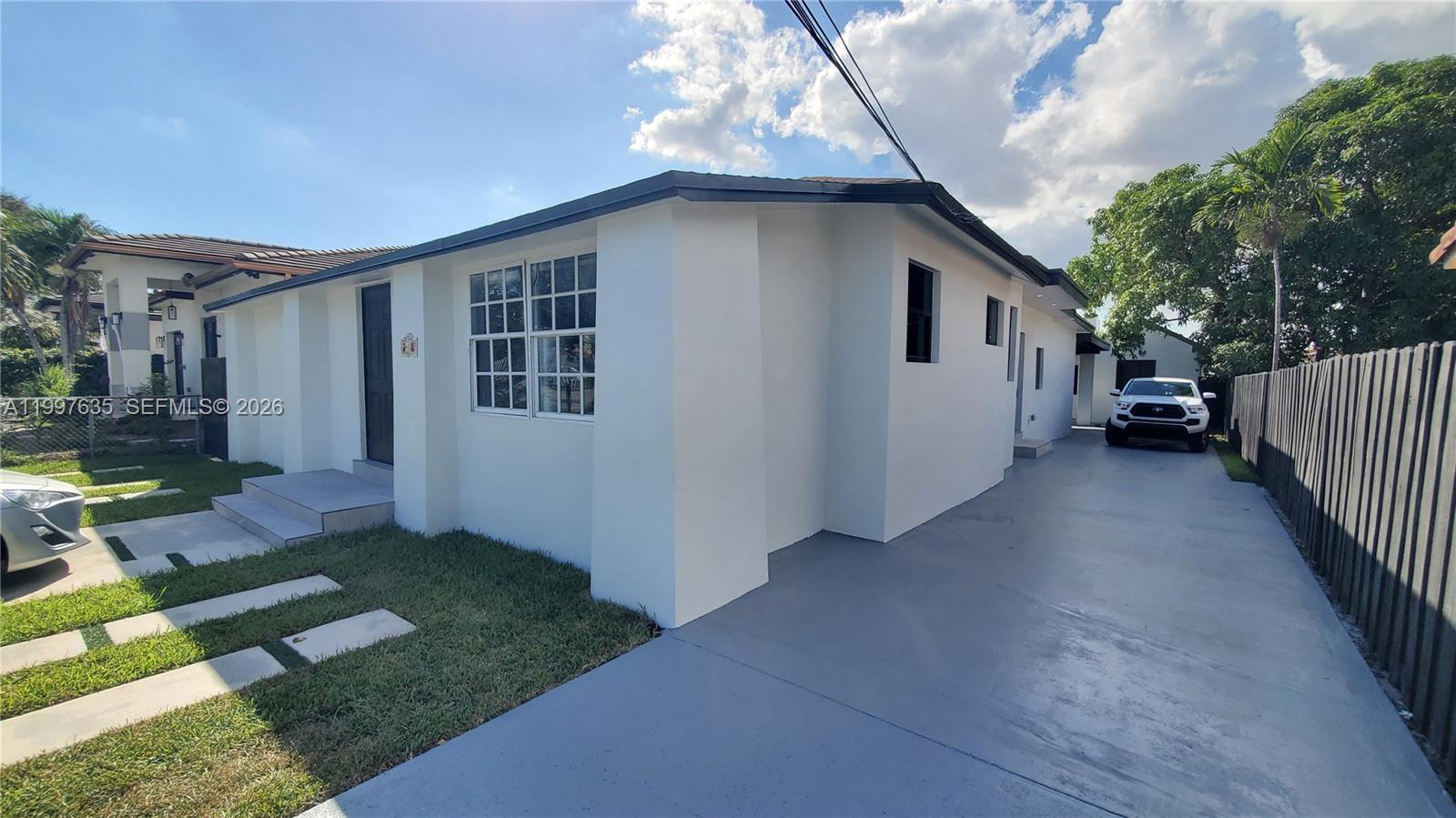 40 Southwest 34th Avenue, Unit A Miami, FL 33135 - Photo 15 of 15 a house view with a backyard space