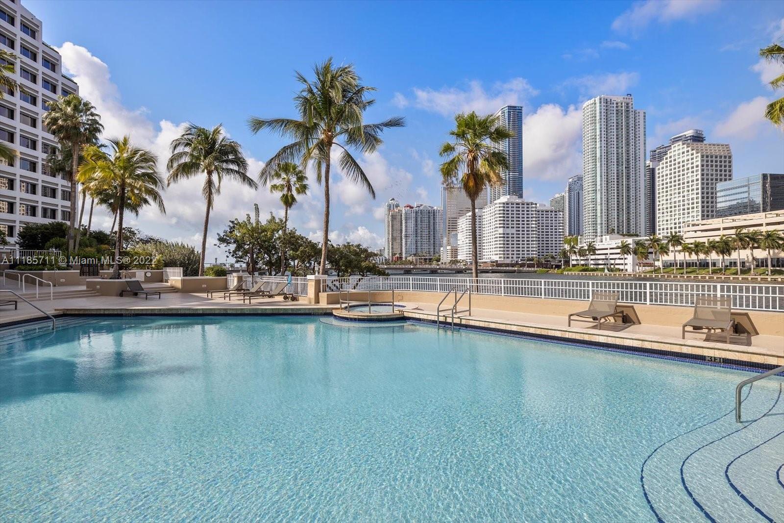 701 Brickell Key Boulevard, Unit 1704 Miami, FL 33131 - Photo 27 of 31 a view of a lake with a city