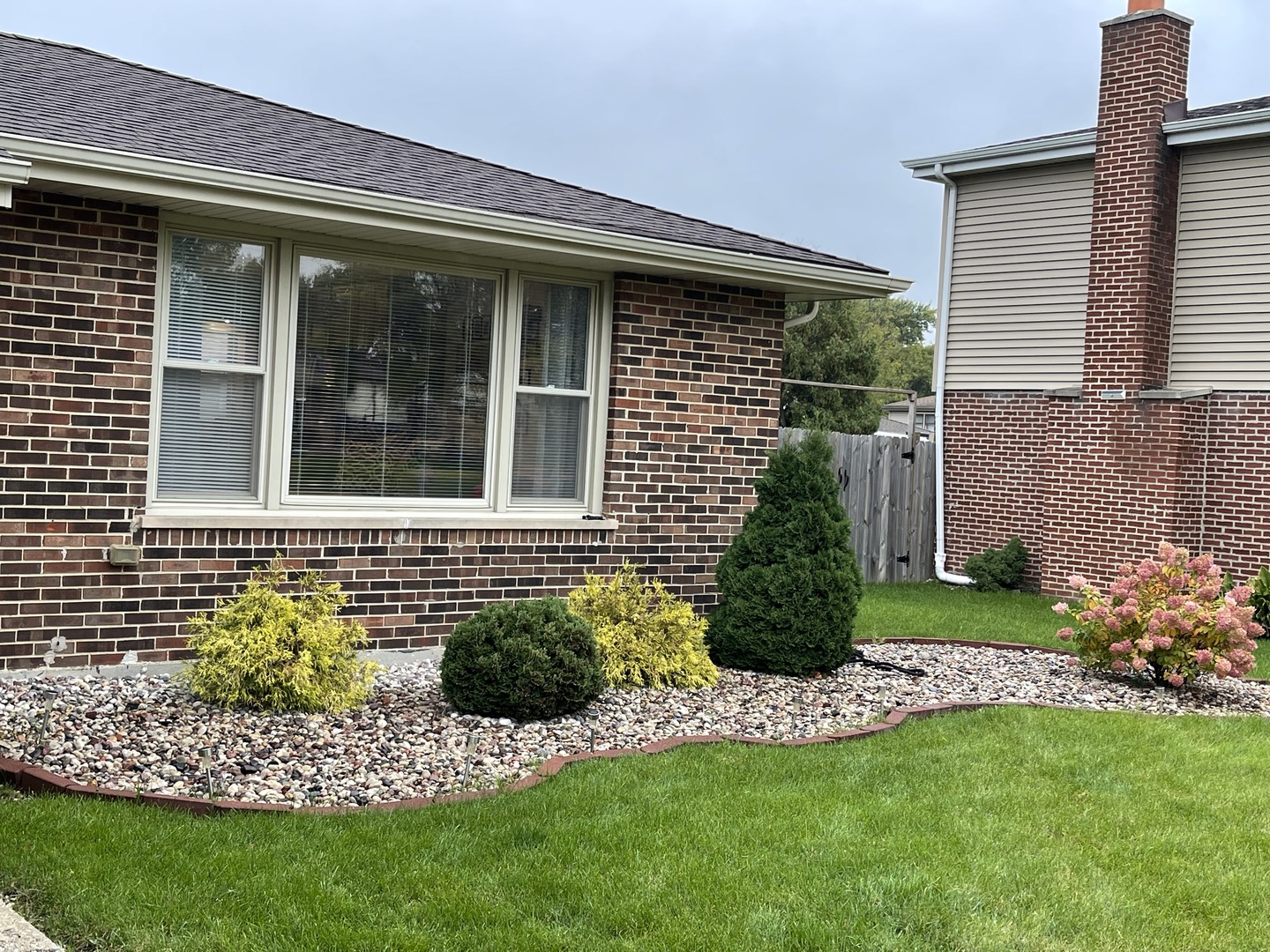 6244 Beaver Dam Road Matteson, IL 60443 - Photo 3 of 36 a front view of a house with a garden