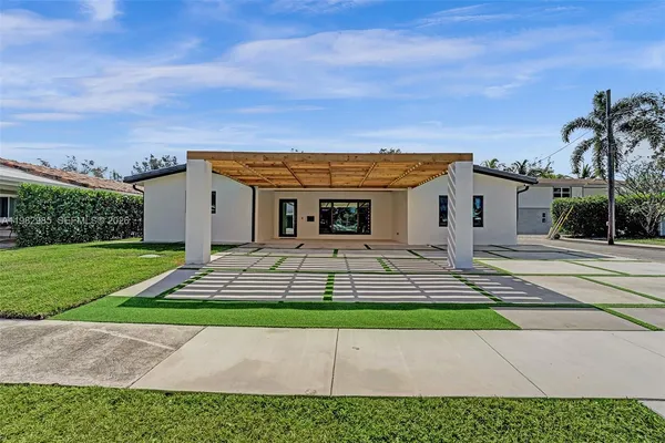 front view of a house with a yard