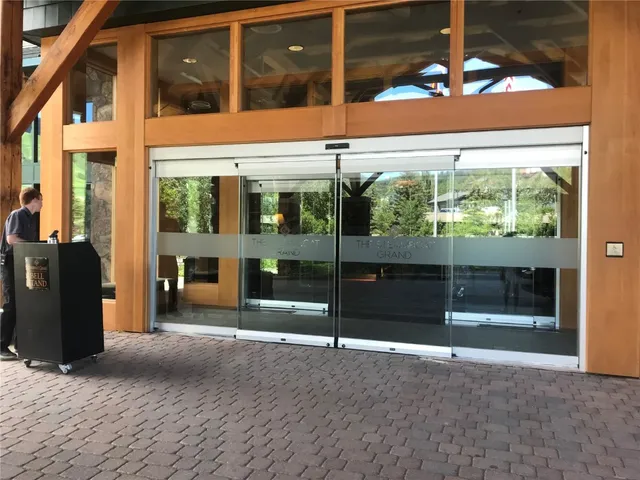 a view of a building with a door and a window