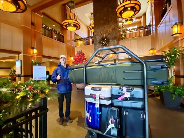 a view of city with the shops and trees