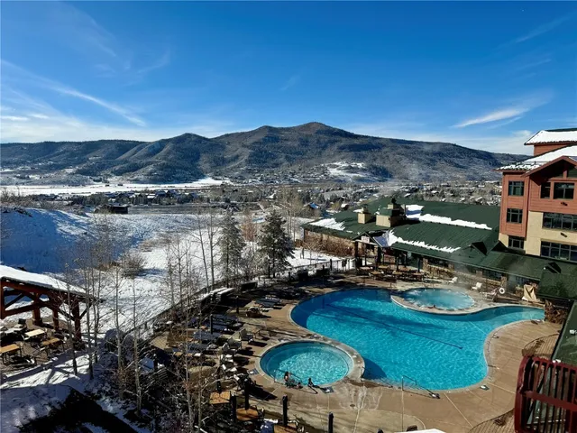 a view of building with swimming pool