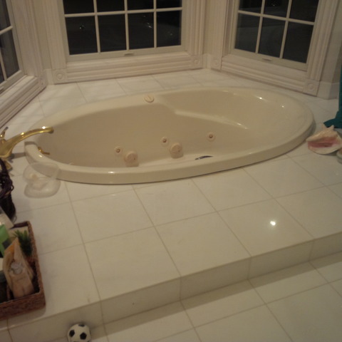 383 West County Line Road Barrington Hills, IL 60010 - Photo 11 of 16 a bathroom with a bathtub