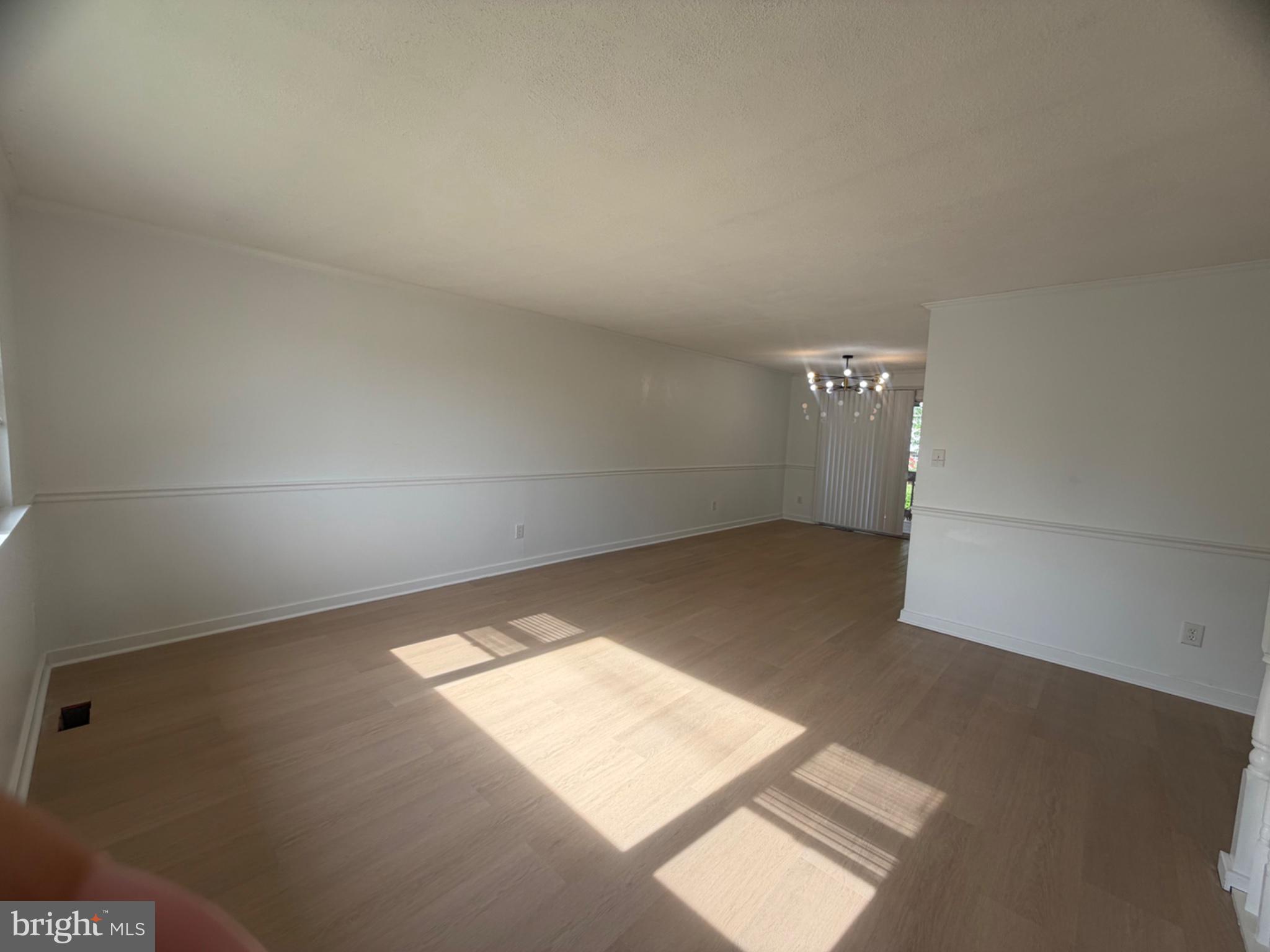 4007 McDonogh Road Randallstown, MD 21133 - Photo 7 of 20 Bright and airy open space awaits.