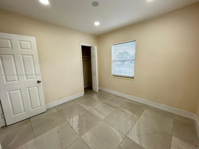 a view of hallway with stairs