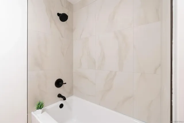 a bathroom with double vanity sink a mirror and vanity