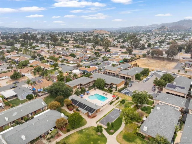 an aerial view of a city with lots of residential buildings