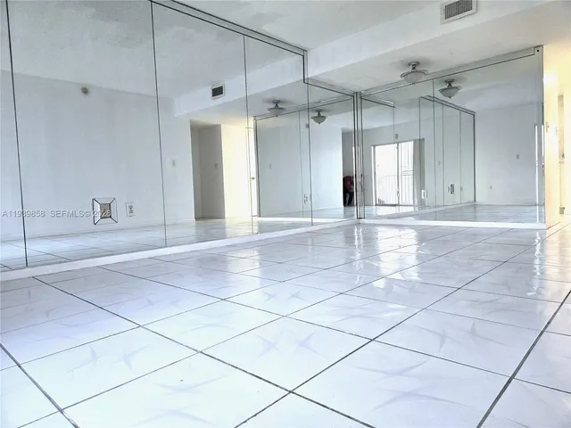 a view of a livingroom with a furniture and a window