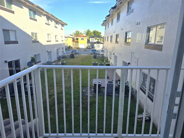a view of a building from a balcony