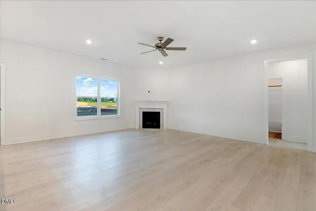 a view of a kitchen with a sink and a stove top oven