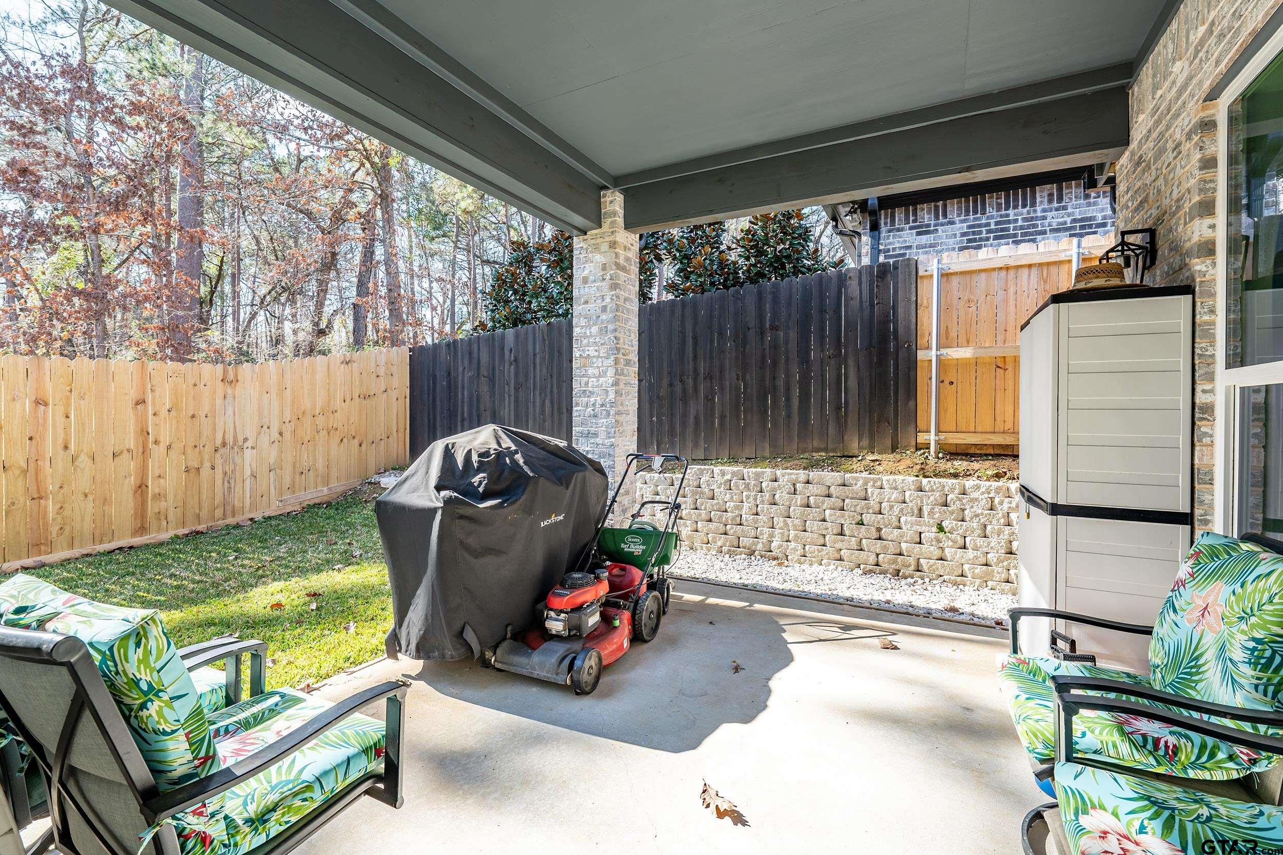 9109 Long Branch Tyler, TX 75703 - Photo 26 of 34 a view of a two chairs in the patio