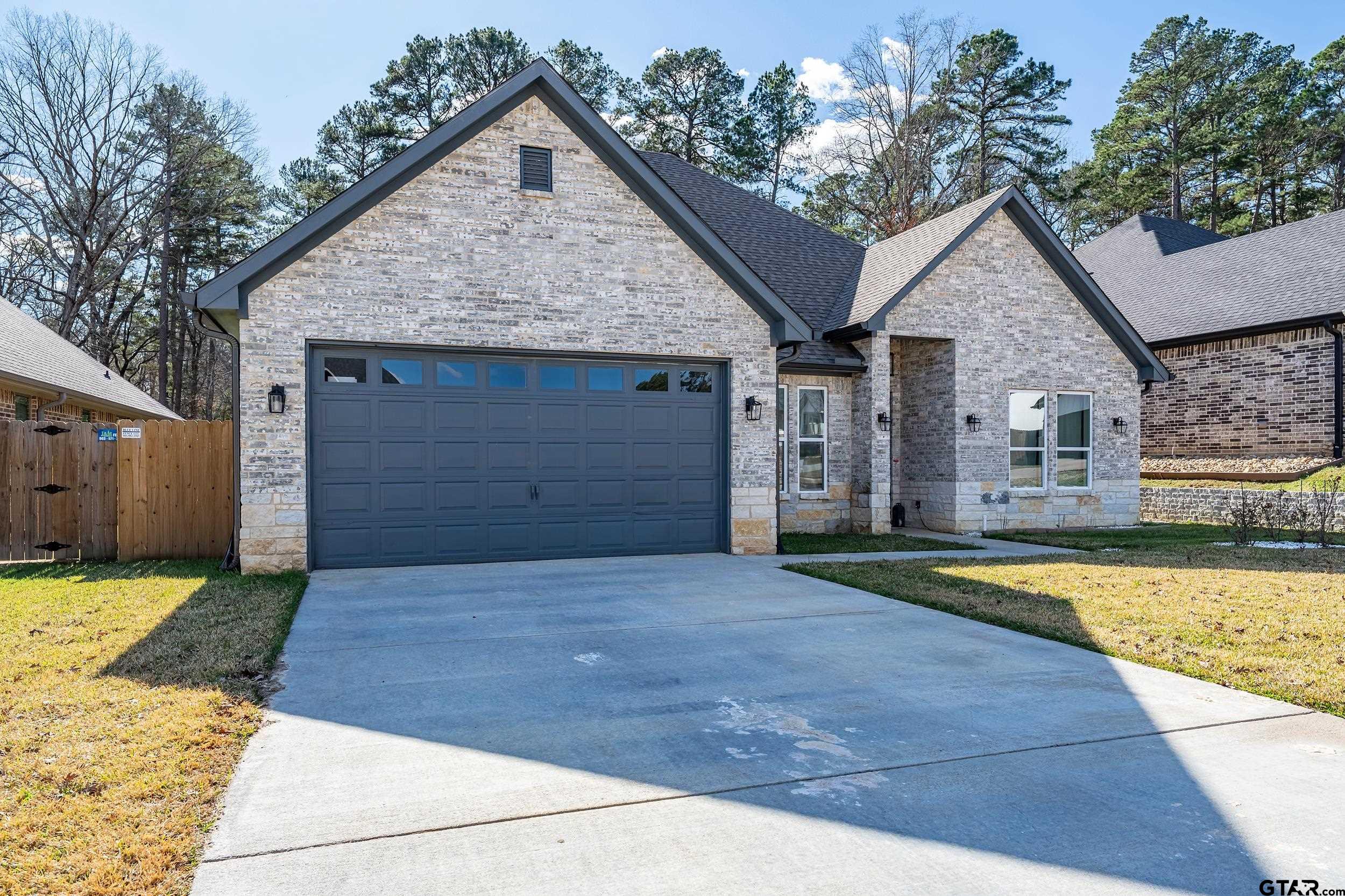 9109 Long Branch Tyler, TX 75703 - Photo 4 of 34 a view of a house with a yard