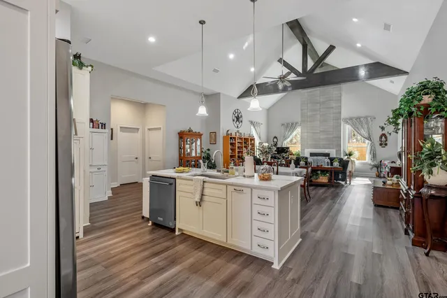 a large kitchen with cabinets
