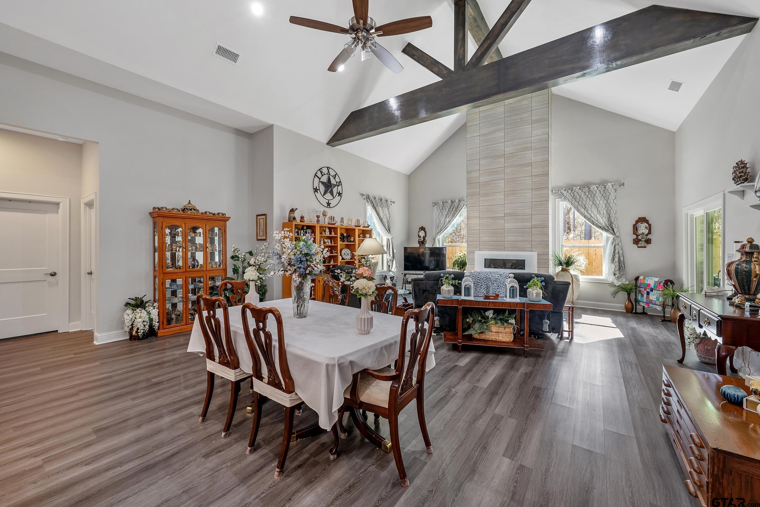 9109 Long Branch Tyler, TX 75703 - Photo 7 of 34 a view of a dining room with furniture and wooden floor